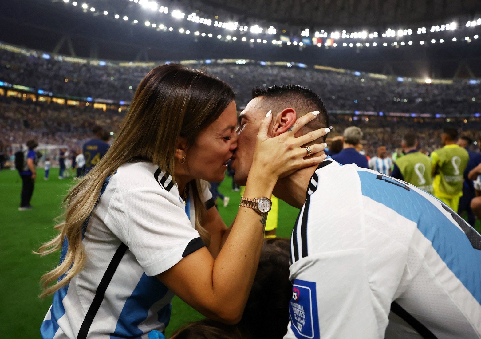 Soccer Football - FIFA World Cup Qatar 2022 - Final - Argentina v France - Lusail Stadium, Lusail, Qatar - December 18, 2022
Argentina's Angel Di Maria with his wife Jorgelina Cardoso after the trophy ceremony REUTERS/Lee Smith