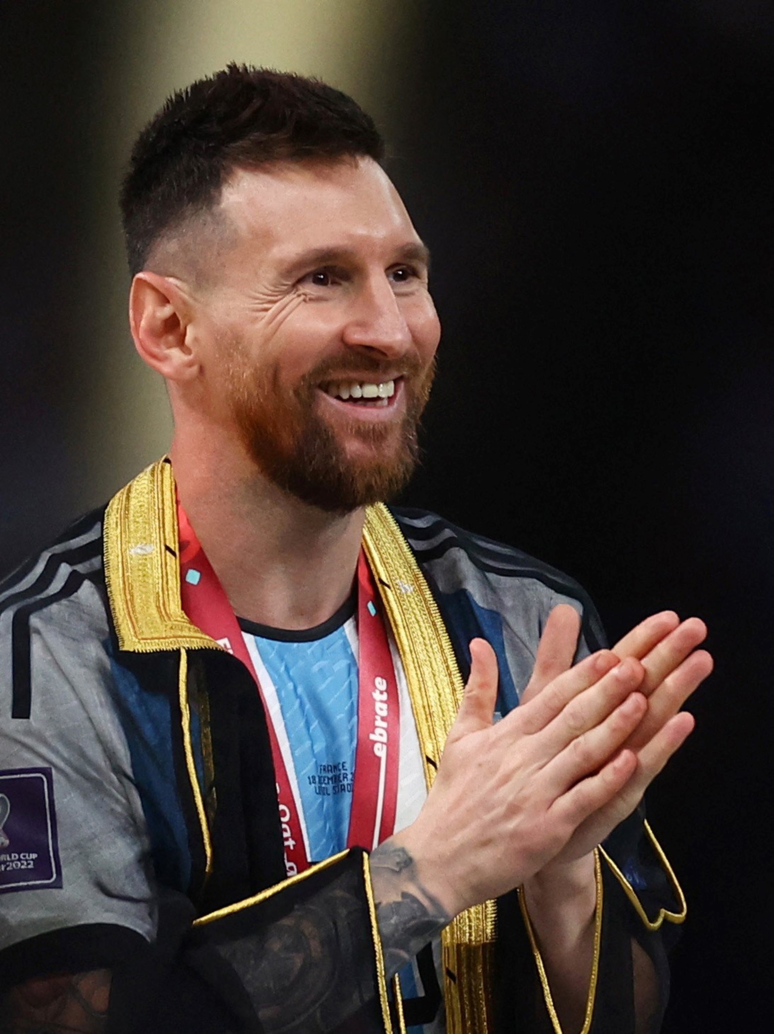 Soccer Football - FIFA World Cup Qatar 2022 - Final - Argentina v France - Lusail Stadium, Lusail, Qatar - December 18, 2022
Argentina's Lionel Messi during the medal ceremony as he celebrates after winning the World Cup REUTERS/Kai Pfaffenbach
