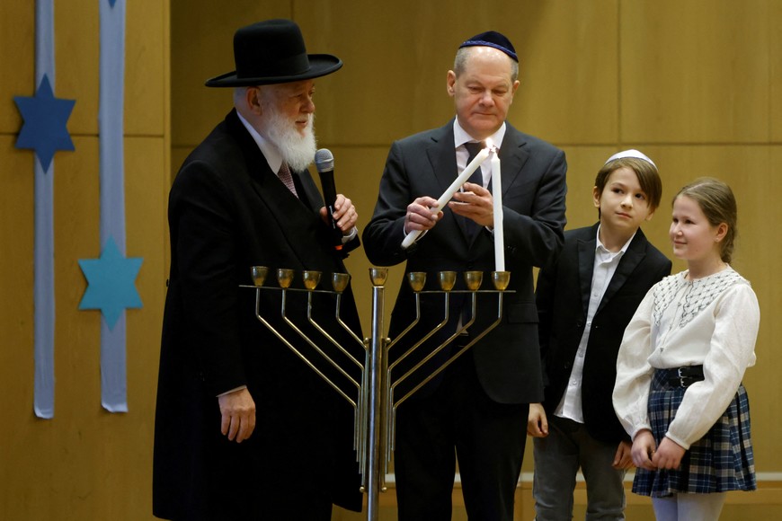German Chancellor Olaf Scholz attends a ceremony at the start of the Hanukkah festival at the Heinz Galinski School of the Jewish Community of Berlin, Germany December 19, 2022. REUTERS/Michele Tantussi