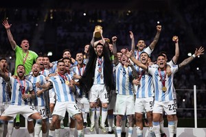 La imagen para toda la posteridad: Argentina campeón del mundo por tercera vez.  Crédito: Xinhua.