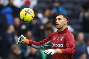 Soccer Football - Premier League - Tottenham Hotspur v Aston Villa - Tottenham Hotspur Stadium, London, Britain - January 1, 2023
Aston Villa's Emiliano Martinez during the warm up before the match Action Images via Reuters/Paul Childs EDITORIAL USE ONLY. No use with unauthorized audio, video, data, fixture lists, club/league logos or 'live' services. Online in-match use limited to 75 images, no video emulation. No use in betting, games or single club	/league/player publications.  Please contact your account representative for further details.