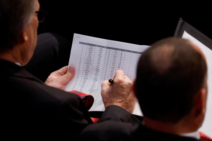 U.S. Rep. Andy Biggs (R-AZ) tallies votes on a piece of paper during the first round of voting, after himself being nominated to oppose U.S. House Republican leader Kevin McCarthy (R-CA), in the vote for the next Speaker of the U.S. House of Representatives in the House Chamber on the first day of the new Congress at the U.S. Capitol in Washington, U.S., January 3, 2023. REUTERS/Jonathan Ernst