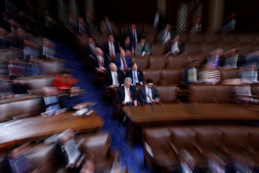 House Republican Leader Kevin McCarthy (R-CA) sits at the center of the House floor as rounds of voting continue in the election of a new Speaker of the House on the third day of the 118th Congress at the U.S. Capitol in Washington, U.S., January 5, 2023. Picture taken while zooming during a long exposure. REUTERS/Evelyn Hockstein