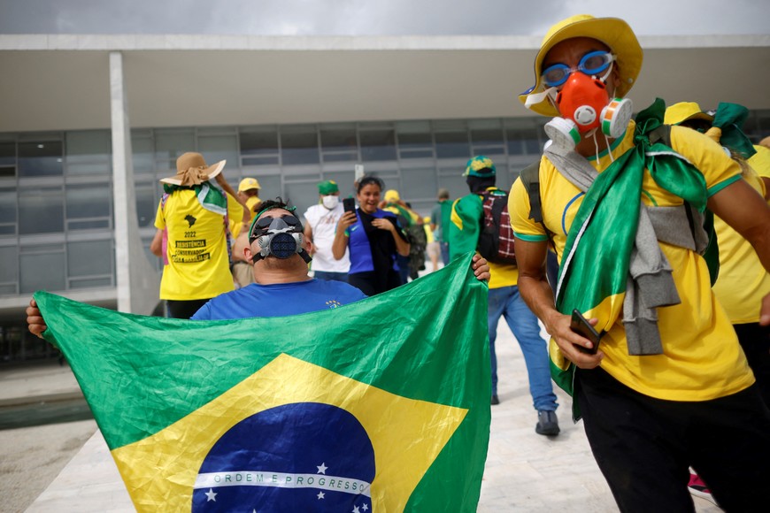 Supporters of Brazil's former President Jair Bolsonaro take part in a demonstration against President Luiz Inacio Lula da Silva, outside Brazil’s National Congress in Brasilia, Brazil, December 8, 2023. REUTERS/Adriano Machado