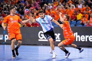 IHF Handball World Championship - Preliminary Round - Argentina v Netherlands - Tauron Arena, Krakow, Poland - January 13, 2023
Netherlands' Kay Smits in action with Argentina's Pedro Martinez REUTERS/Tomasz Markowski