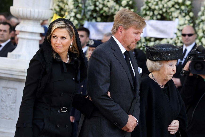 The Netherlands' King Willem-Alexander, Queen Maxima and Princess Beatrix walk on the day of the funeral of former King of Greece Constantine II, in Athens, Greece, January 16, 2023. REUTERS/Louiza Vradi