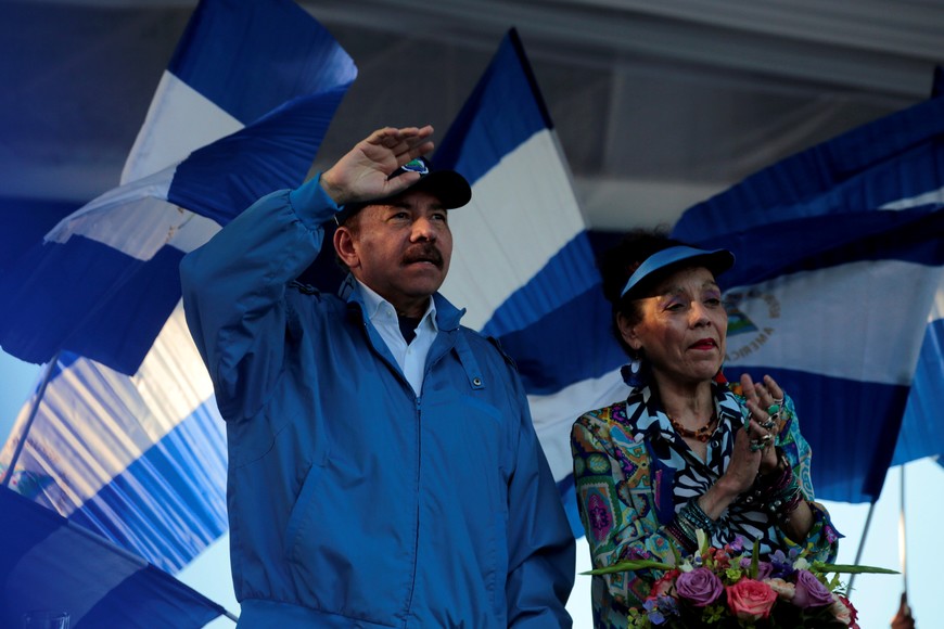 FILE PHOTO: Nicaraguan President Daniel Ortega and Vice President Rosario Murillo gesture during a march called "We walk for peace and life. Justice" in Managua, Nicaragua, September 5, 2018. REUTERS/Oswaldo Rivas/File Photo