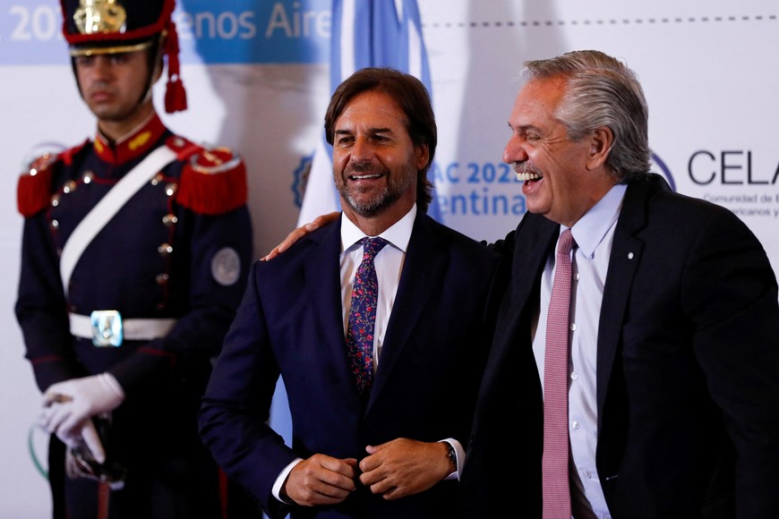 Argentina's President Alberto Fernandez and Uruguay's President Luis Lacalle Pou meet at the 7th Heads of State and Government Summit of the Community of Latin American and Caribbean States (CELAC), in Buenos Aires, Argentina, January 24, 2023. REUTERS/Agustin Marcarian