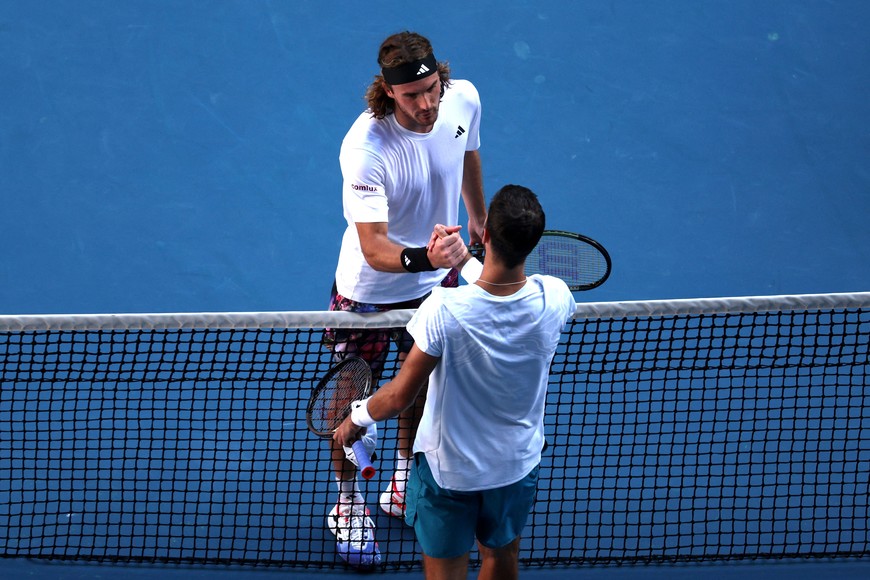 Tennis - Australian Open - Melbourne Park, Melbourne, Australia - January 27, 2023
Greece’s Stefanos Tsitsipas with Russia's Karen Khachanov after their semi final match REUTERS/Loren Elliott