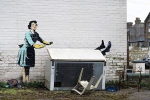 An artwork depicting violence against women, painted by street artist Banksy for the occasion of Valentines Day, is seen on a wall in Margate, Kent, Britain, February 14, 2023 in this picture obtained from social media. Valentine’s day mascara @banksy/via REUTERS  THIS IMAGE HAS BEEN SUPPLIED BY A THIRD PARTY. MANDATORY CREDIT. NO RESALES. NO ARCHIVES.