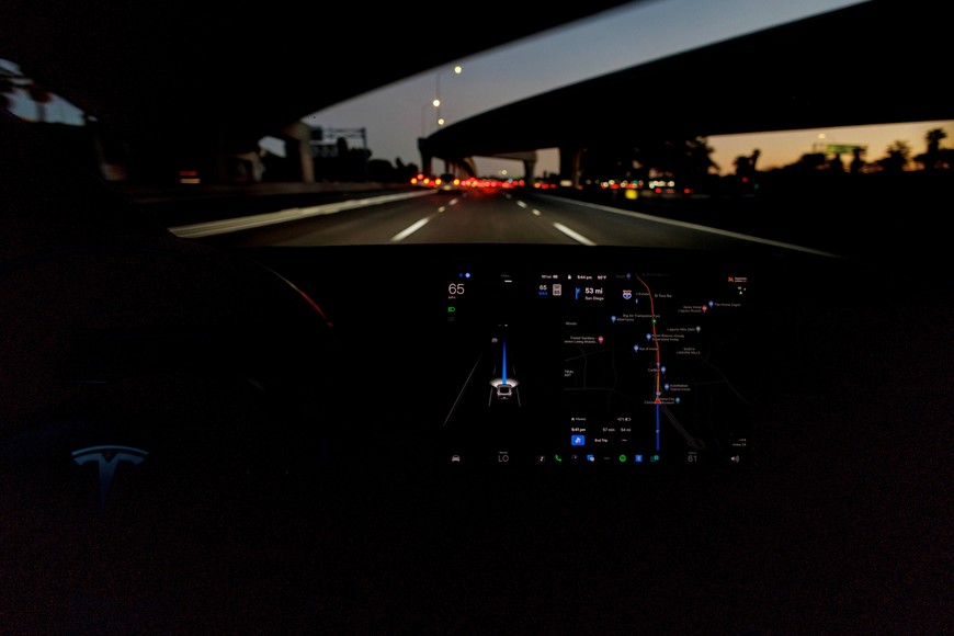 A Tesla Model 3 vehicle is shown driving using Full Self Driving (FSD) beta software on a California highway near Irvine, California, U.S., February 7, 2023.  Tesla Inc TSLA.O said it would recall 362,000 U.S. vehicles to update its Full Self-Driving (FSD) Beta software after U.S. regulators said on Thursday the driver assistance system did not adequately adhere to traffic safety laws and could cause crashes.       REUTERS/Mike Blake