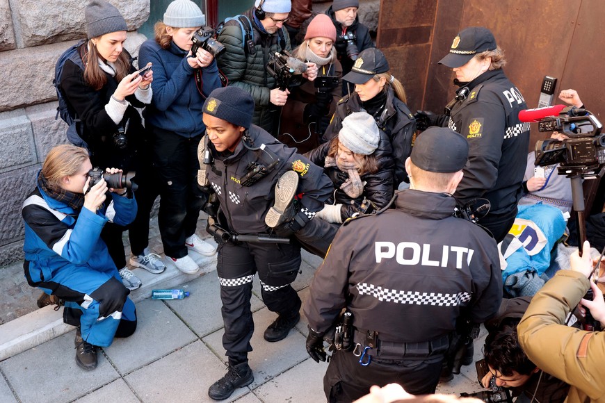 Greta Thunberg is carried away as activits demonstrate outside the Ministry of Finance entrance and several other ministries in protest that the wind turbines at Fosen, which the Supreme Court has said are illegal, have not been demolished.  Alf Simensen/NTB/via REUTERS   ATTENTION EDITORS - THIS IMAGE WAS PROVIDED BY A THIRD PARTY. NORWAY OUT. NO COMMERCIAL OR EDITORIAL SALES IN NORWAY.