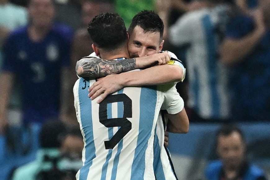 Soccer Football - FIFA World Cup Qatar 2022 - Semi Final - Argentina v Croatia - Lusail Stadium, Lusail, Qatar - December 13, 2022
Argentina's Julian Alvarez celebrates scoring their third goal with Lionel Messi REUTERS/Dylan Martinez