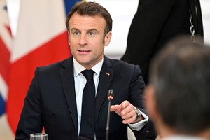 France's President Emmanuel Macron takes part in a round table with French and British companies, as part of a Franco-British summit in Paris, France on March 10, 2023. Emmanuel Dunand/Pool via REUTERS