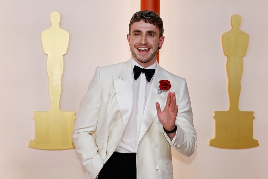 Paul Mescal poses on the champagne-colored red carpet during the Oscars arrivals at the 95th Academy Awards in Hollywood, Los Angeles, California, U.S., March 12, 2023. REUTERS/Eric Gaillard