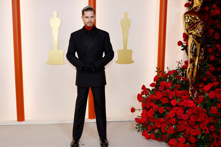 Lukas Dhont poses on the champagne-colored red carpet during the Oscars arrivals at the 95th Academy Awards in Hollywood, Los Angeles, California, U.S., March 12, 2023. REUTERS/Eric Gaillard