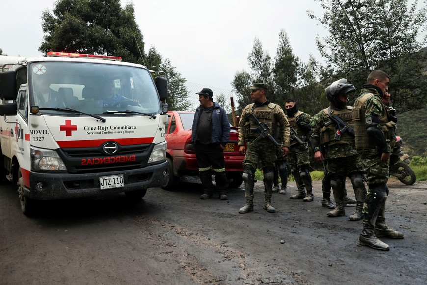 An ambulance arrives as rescue personnel continue the search for miners trapped following an explosion in a coal mine in Sutatausa, Colombia, March 15, 2023. REUTERS/Luisa Gonzalez