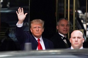 Former U.S. President Donald Trump departs from Trump Tower, on the day of Trump's planned court appearance after his indictment by a Manhattan grand jury following a probe into hush money paid to porn star Stormy Daniels, in New York City, U.S., April 4, 2023. REUTERS/David Dee Delgado