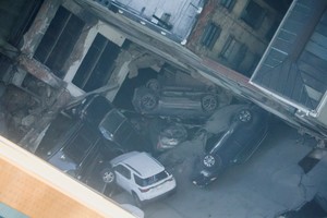 Cars are seen piled up after the collapse of a parking garage in the Manhattan borough of New York City, U.S., April 18, 2023.  REUTERS/Brendan McDermid