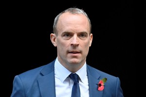 FILE PHOTO: British Deputy Prime Minister and Justice Secretary Dominic Raab walks outside Number 10 Downing Street, in London, Britain November 8, 2022. REUTERS/Toby Melville/File Photo