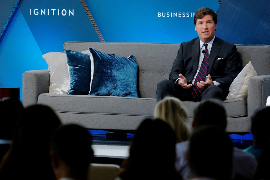 FILE PHOTO: Fox personality Tucker Carlson speaks at the 2017 Business Insider Ignition: Future of Media conference in New York, U.S., November 30, 2017. REUTERS/Lucas Jackson/ File Photo