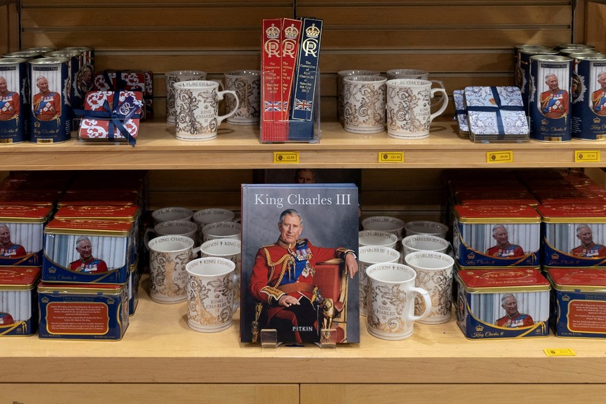 FILE PHOTO: Themed merchandise is displayed in a souvenir shop ahead of the coronation of Britain's King Charles, in London, Britain, April 12, 2023. REUTERS/May James/File Photo