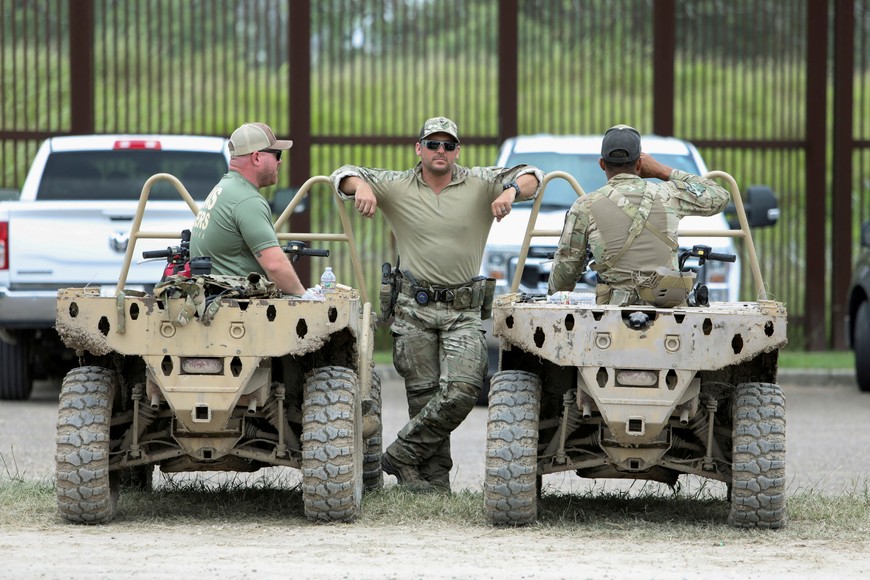 Texas Department of Public Safety Special Operations Group officers are seen at a law enforcement staging area next to the border wall as the United States prepares to lift COVID-19 era Title 42 restrictions that have blocked migrants at the U.S.-Mexico border from seeking asylum since 2020, near Brownsville, Texas, U.S., May 11, 2023. REUTERS/John Faulk 
NO RESALES. NO ARCHIVES
