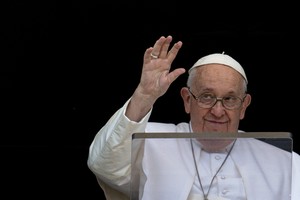 FILE PHOTO: Pope Francis waves as he leads Regina Caeli prayer from his window at the Vatican, May 7, 2023. Vatican Media/­Handout via REUTERS    ATTENTION EDITORS - THIS IMAGE WAS PROVIDED BY A THIRD PARTY./File Photo