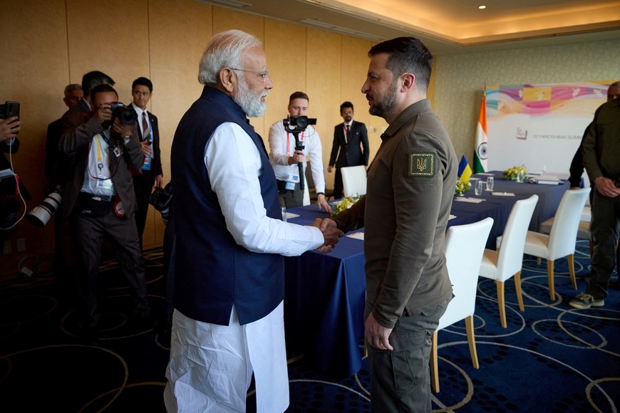 Ukraine's President Volodymyr Zelenskiy and Indian Prime Minister Narendra Modi shake hands during the G7 leaders' summit in Hiroshima, Japan May 20, 2023.  Ukrainian Presidential Press Service/Handout via REUTERS ATTENTION EDITORS - THIS IMAGE HAS BEEN SUPPLIED BY A THIRD PARTY.