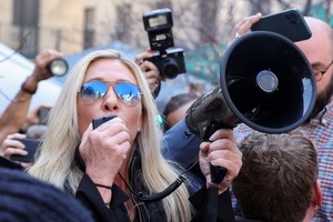 U.S. Rep. Marjorie Taylor Greene (R-GA) speaks outside Manhattan Criminal Courthouse on the day of former U.S. President Donald Trump's planned court appearance after his indictment by a Manhattan grand jury following a probe into hush money paid to porn star Stormy Daniels, in New York City, U.S., April 4, 2023. REUTERS/Caitlin Ochs