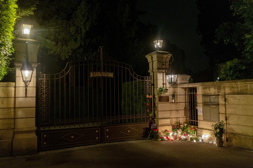 Flowers and candles are pictured in front of the home of Tina Tuner in Kuesnacht near Zurich, Switzerland May 25, 2023.  REUTERS/Denis Balibouse