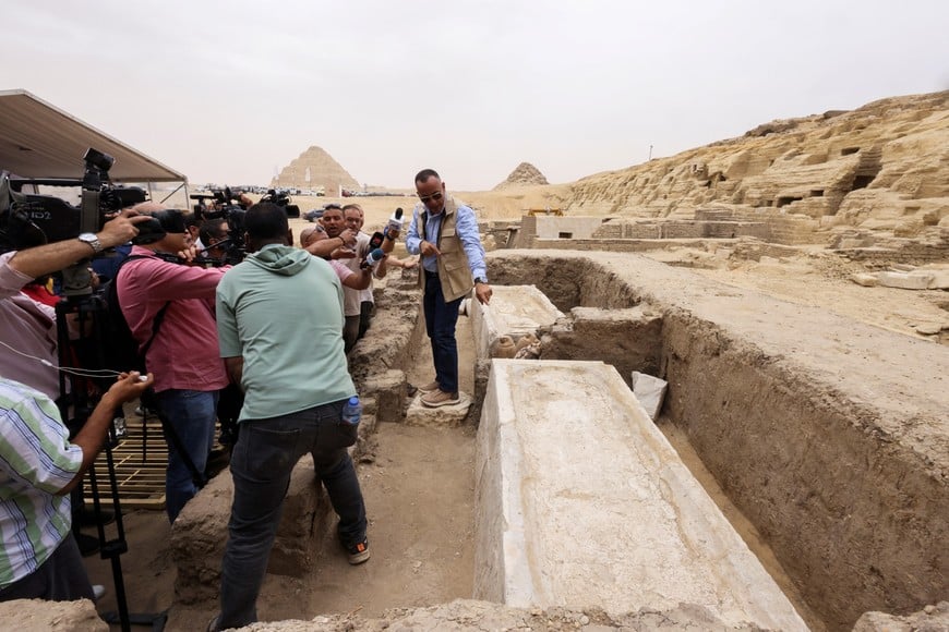 Mostafa Waziri, secretary-general of Egypt's Supreme Council of Antiquities talks to the media next to an embalming workshop site for humans found at the newly discovered site where embalming workshops for humans and animals along with two tombs and a collection of artefacts were also found, near Egypt's Saqqara necropolis, in Giza, Egypt May 27, 2023. REUTERS/Amr Abdallah Dalsh