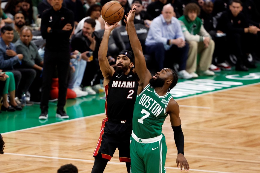 May 29, 2023; Boston, Massachusetts, USA; Miami Heat guard Gabe Vincent (2) shoots against Boston Celtics guard Jaylen Brown (7) during the third quarter of game seven of the Eastern Conference Finals for the 2023 NBA playoffs at TD Garden. Mandatory Credit: Winslow Townson-USA TODAY Sports