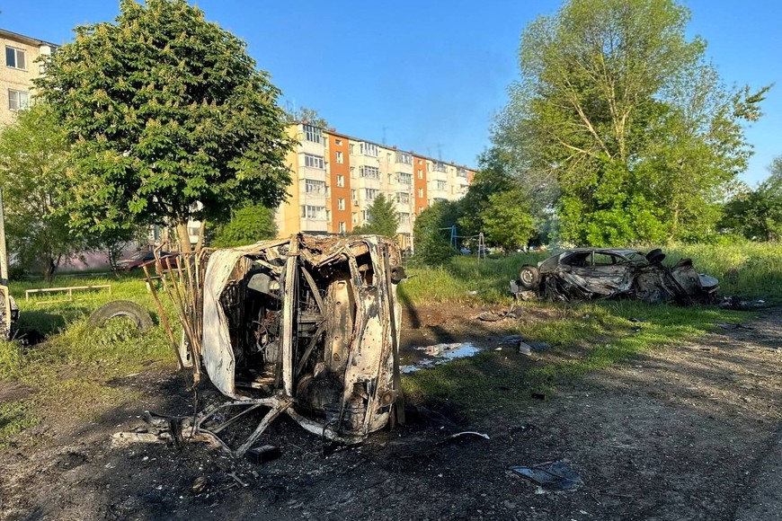 FILE PHOTO: A view shows destroyed vehicles following what was said to be Ukrainian forces' shelling in the course of Russia-Ukraine conflict in the town of Shebekino in the Belgorod region, Russia, in this handout image released May 31, 2023. Governor of Russia's Belgorod Region Vyacheslav Gladkov via Telegram/Handout via REUTERS ATTENTION EDITORS - THIS IMAGE HAS BEEN SUPPLIED BY A THIRD PARTY. NO RESALES. NO ARCHIVES./File Photo