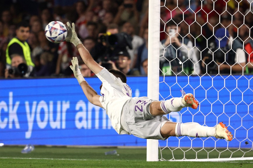 Soccer Football - UEFA Nations League Final - Croatia v Spain - Feyenoord Stadium, Rotterdam, Netherlands - June 18, 2023
Spain's Unai Simon saves a penalty from Croatia's Bruno Petkovic during the penalty shootout REUTERS/Yves Herman