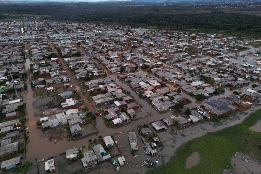 An aerial view shows damage and floods due to heavy rains after an extra-tropical cyclone, in Sao Leopoldo, Rio Grande do Sul state, Brazil June 17, 2023. REUTERS/Diego Vara