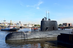 FILE PHOTO: The Argentine military submarine ARA San Juan and crew are seen leaving the port of Buenos Aires, Argentina June 2, 2014. Armada Argentina/Handout via REUTERS ATTENTION EDITORS - THIS IMAGE WAS PROVIDED BY A THIRD PARTY./File Photo