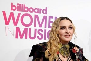 FILE PHOTO: Madonna poses on the red carpet a the Billboard Magazine's 11th annual Women in Music luncheon in New York, U.S., December 9, 2016.  REUTERS/Shannon Stapleton/File Photo