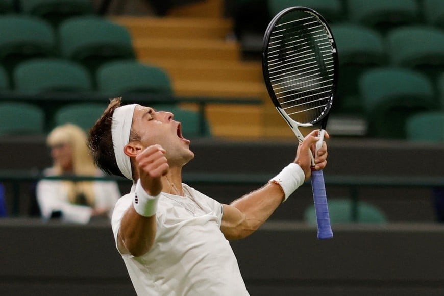 Tennis - Wimbledon - All England Lawn Tennis and Croquet Club, London, Britain - July 4, 2023
Argentina's Toma Etcheverry celebrates after winning his first round match against Spain's Bernabe Zapata Miralles REUTERS/Andrew Couldridge