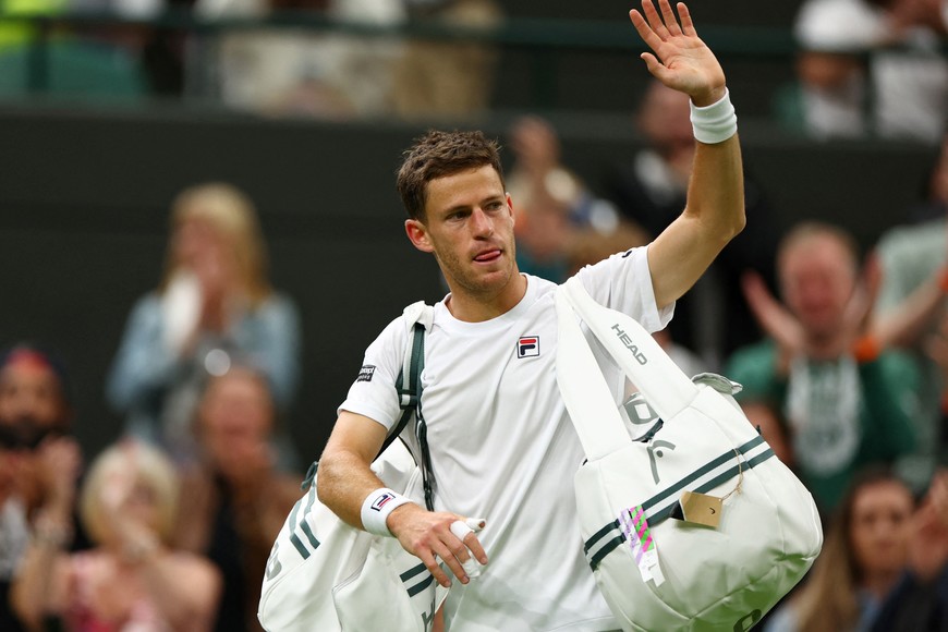 Tennis - Wimbledon - All England Lawn Tennis and Croquet Club, London, Britain - July 5, 2023
 Argentina's Diego Schwartzman looks dejected after his second round match against Italy's Jannik Sinner REUTERS/Toby Melville
