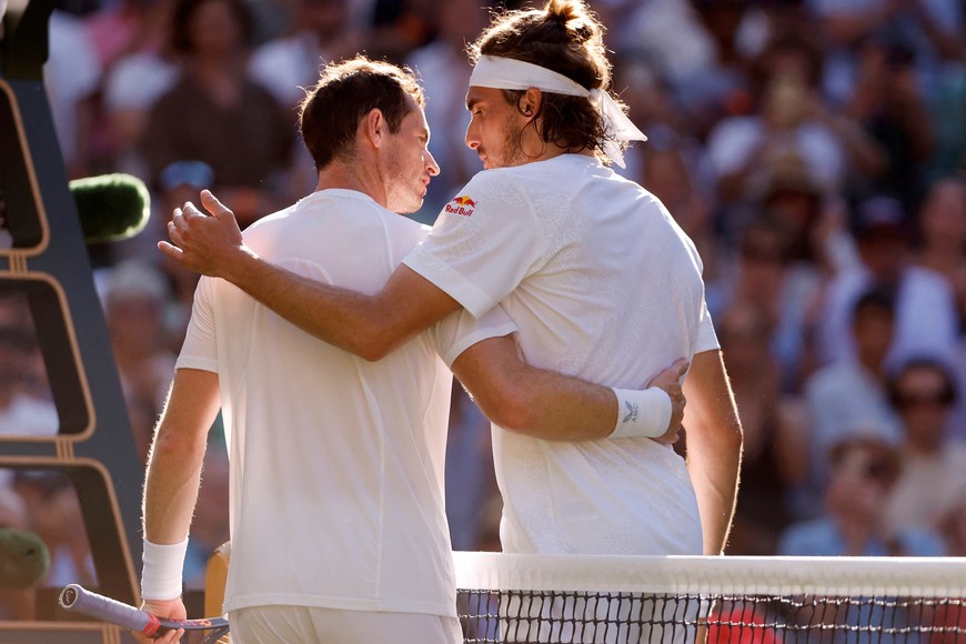 Tennis - Wimbledon - All England Lawn Tennis and Croquet Club, London, Britain - July 7, 2023
GreeceÕs Stefanos Tsitsipas with BritainÕs Andy Murray after winning their second round match REUTERS/Andrew Couldridge     TPX IMAGES OF THE DAY