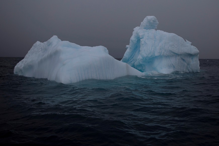 FILE PHOTO: An iceberg floats near Two Hummock Island, Antarctica, February 1, 2020. Picture taken February 1, 2020. REUTERS/Ueslei Marcelino/File Photo