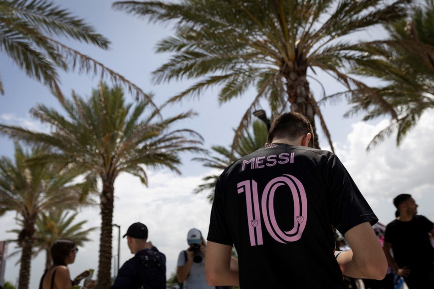A supporter wears the Inter Miami team t-shirt of Argentinian soccer player Leo Messi during a gathering outside the Inter Miami DRV Pnk Stadium, in Fort Lauderdale, Florida, U.S., July 11, 2023. REUTERS/Marco Bello