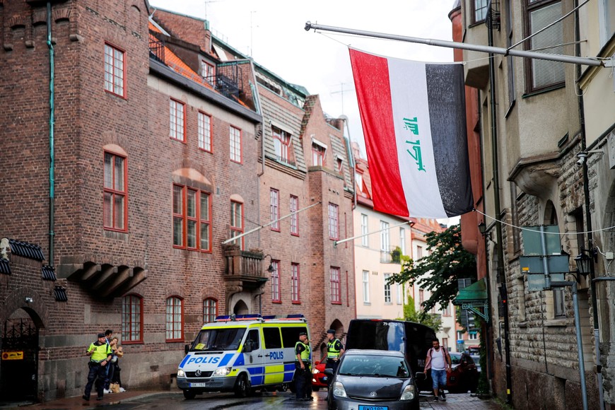 Police officers stand near Iraqi embassy ahead of a demonstration in Stockholm, Sweden July 20, 2023. TT News Agency/Caisa Rasmussen via REUTERS      ATTENTION EDITORS - THIS IMAGE WAS PROVIDED BY A THIRD PARTY. SWEDEN OUT. NO COMMERCIAL OR EDITORIAL SALES IN SWEDEN.
