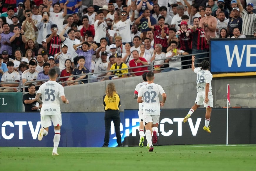 Jul 23, 2023; Pasadena, California, USA; AC Milan forward Luis Romero (18) celebrates after scoring a goal against e Real Madrid in the first half at the Rose Bowl. Mandatory Credit: Kirby Lee-USA TODAY Sports