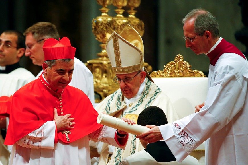 FILE PHOTO: New cardinal Giovanni Angelo Becciu of Italy is seen during a consistory ceremony to install 14 new cardinals in Saint Peter's Basilica at the Vatican, June 28 2018. REUTERS/Tony Gentile/File Photo