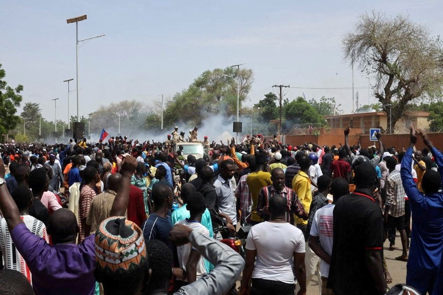 Nigerien security forces launch tear gas to disperse pro-junta demonstrators gathered outside the French embassy, in Niamey, the capital city of Niger July 30, 2023. REUTERS/Souleymane Ag Anara NO RESALES. NO ARCHIVES