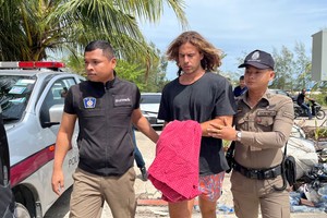Daniel Sancho Bronchalo, the son of Spanish actor Rodolfo Sancho Aguirre is escorted while assisting Thai police with investigations after he was arrested on charges of murder in the death and dismemberment of his Colombian travelling companion Edwin Arrieta Arteaga on the tourist island of Koh Phangan, Thailand August 7, 2023. REUTERS/Stringer   NO RESALES. NO ARCHIVES