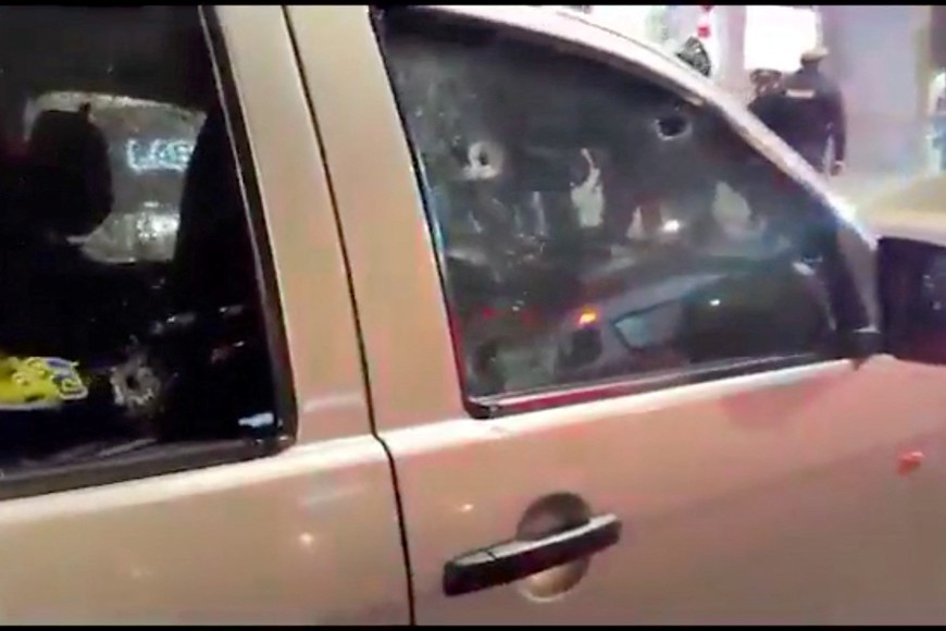 A vehicle with bullet holes on its windows is seen, in the aftermath of the killing of Ecuadorean presidential candidate Fernando Villavicencio, in a location given as Quito, Ecuador in this screen grab from a video released on August 10, 2023. Policia Nacional de Ecuador/Handout via REUTERS    THIS IMAGE HAS BEEN SUPPLIED BY A THIRD PARTY. NO RESALES. NO ARCHIVES. MANDATORY CREDIT