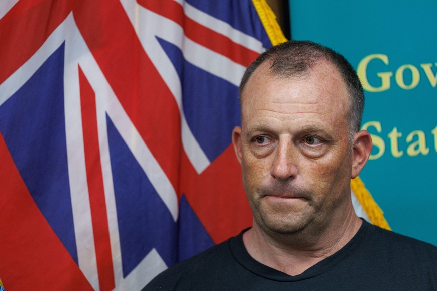 Hawaii's Governor Josh Green listens during a press conference about the Maui Fire in Kahului on Maui island, Hawaii, U.S., August 12, 2023.  REUTERS/Mike Blake